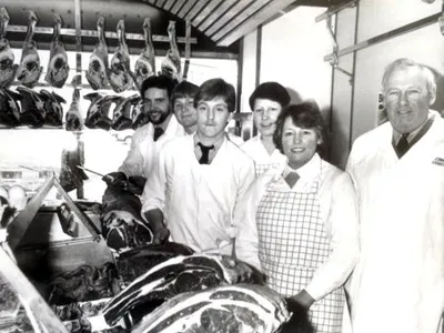 Shop staff with Gwenda and Peter on right